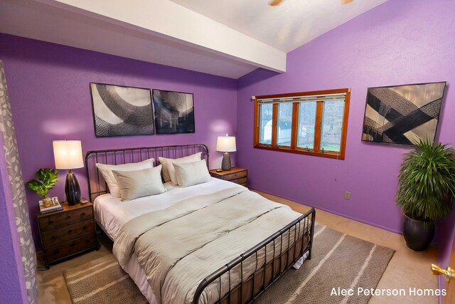 bedroom with carpet flooring and lofted ceiling with beams