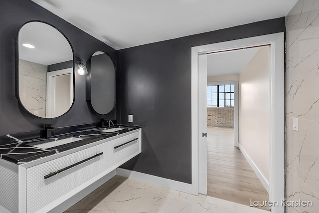 bathroom featuring hardwood / wood-style floors and vanity