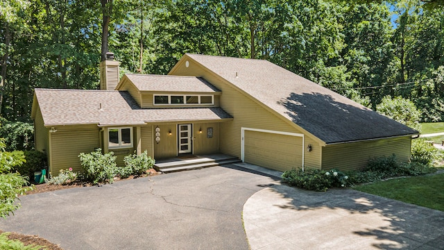 view of front of property with a garage