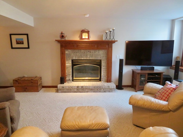 carpeted living room with a fireplace