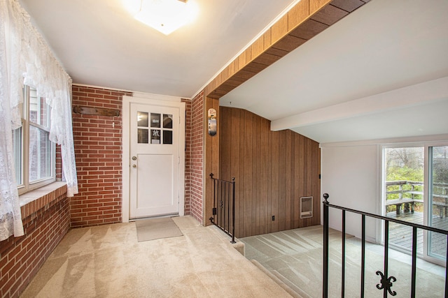 doorway to property featuring heating unit