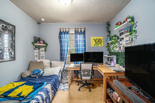 carpeted bedroom featuring a textured ceiling