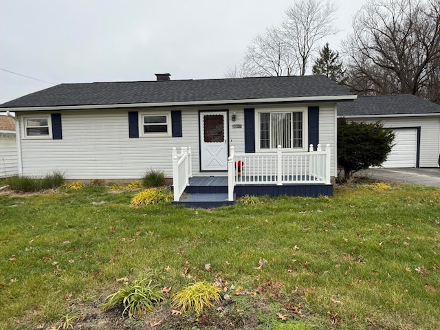 ranch-style home with covered porch and a front yard