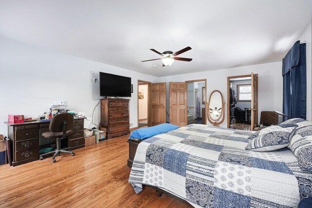 bedroom featuring ceiling fan and light wood-type flooring