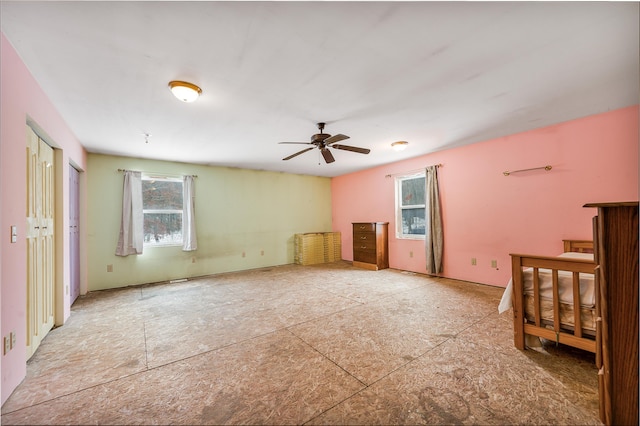 unfurnished bedroom with ceiling fan