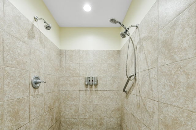 bathroom with a tile shower