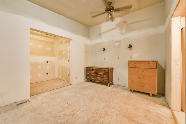 unfurnished room with ceiling fan