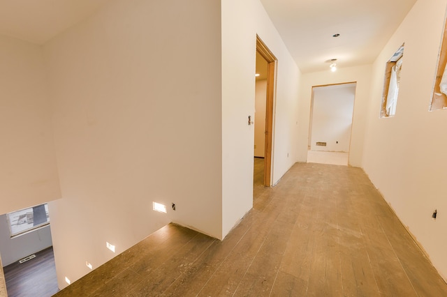 hall featuring light hardwood / wood-style flooring