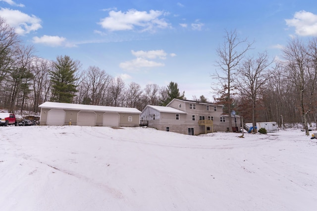 yard layered in snow with an outdoor structure