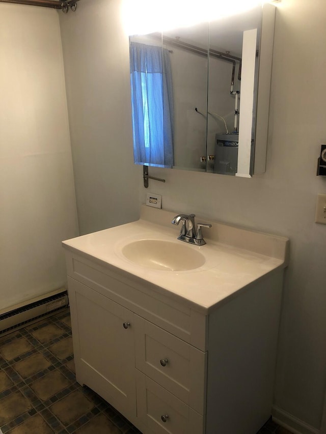 bathroom featuring a baseboard radiator and vanity