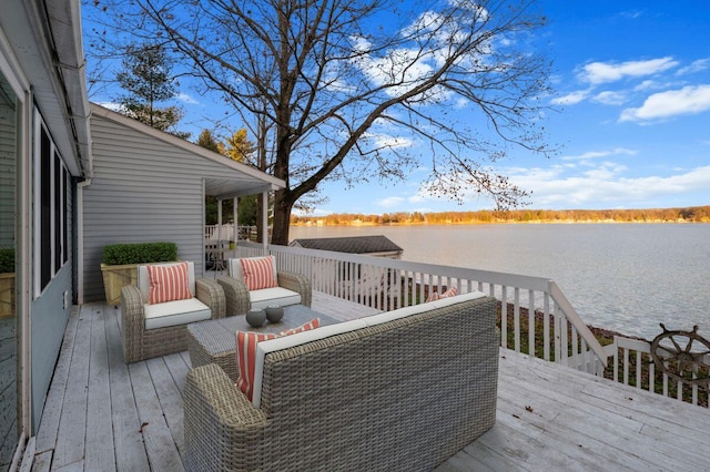 wooden terrace with a water view