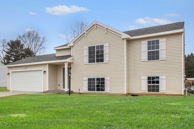 split level home featuring a front yard and a garage