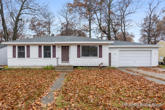 single story home with a garage