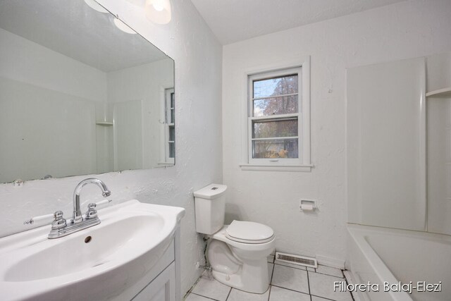 full bathroom with tile patterned floors, vanity, toilet, and shower / washtub combination