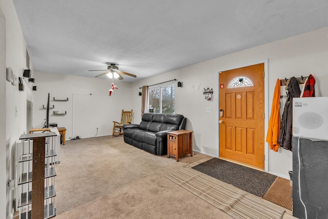 living room with light carpet and ceiling fan