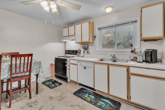 kitchen with ceiling fan, dishwasher, sink, stove, and white cabinets