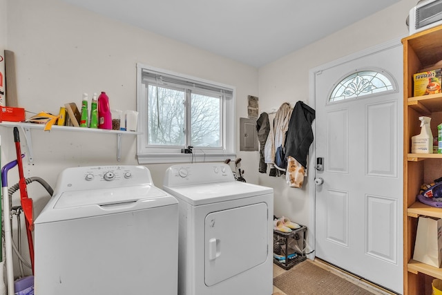 laundry area with separate washer and dryer