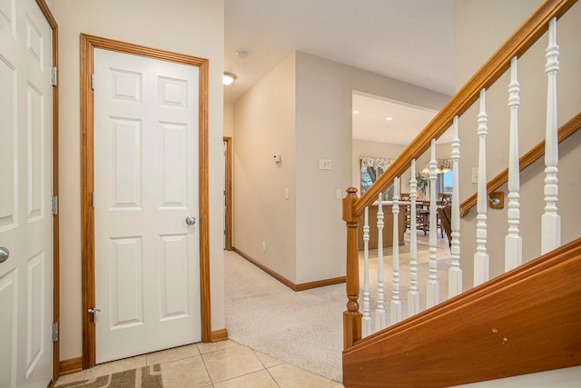 foyer with light tile patterned floors