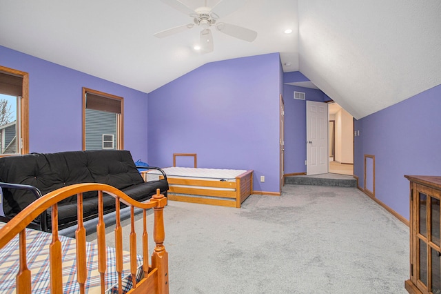 bedroom with ceiling fan, light carpet, and lofted ceiling