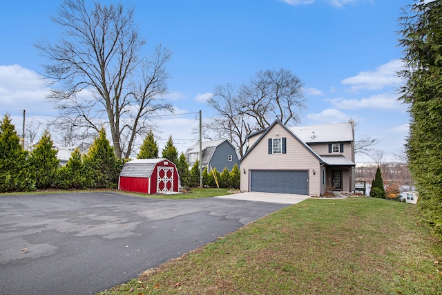 view of property featuring a front yard and a shed