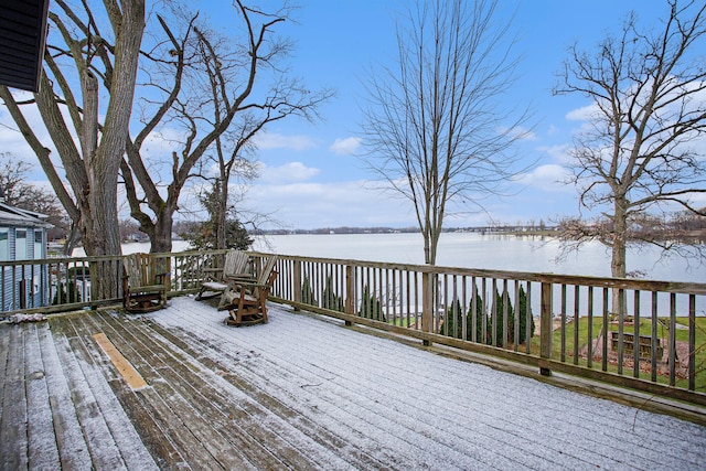 deck featuring a water view