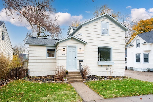 view of front of home featuring a front yard