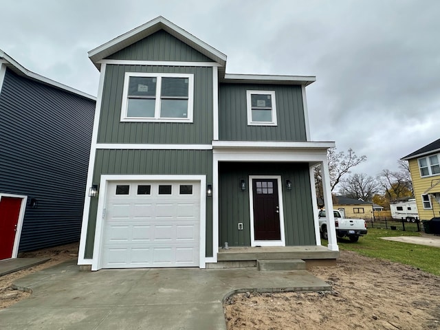 view of front of property with a garage