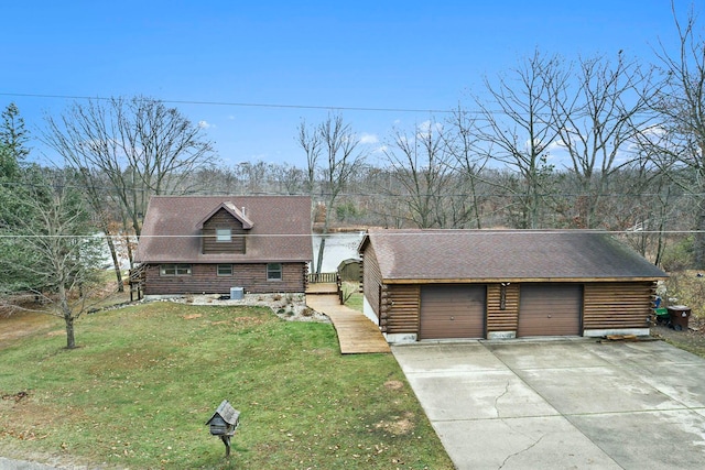 log-style house with a front yard and a garage