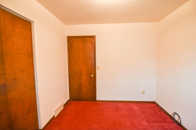 empty room with carpet floors