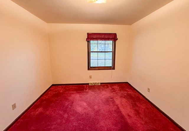 unfurnished room featuring carpet floors