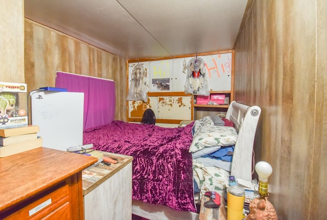 bedroom with wooden walls