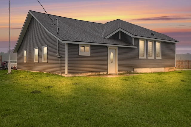 view of front of house with a lawn