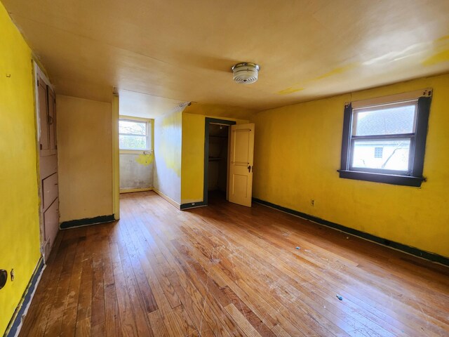 unfurnished bedroom featuring hardwood / wood-style floors