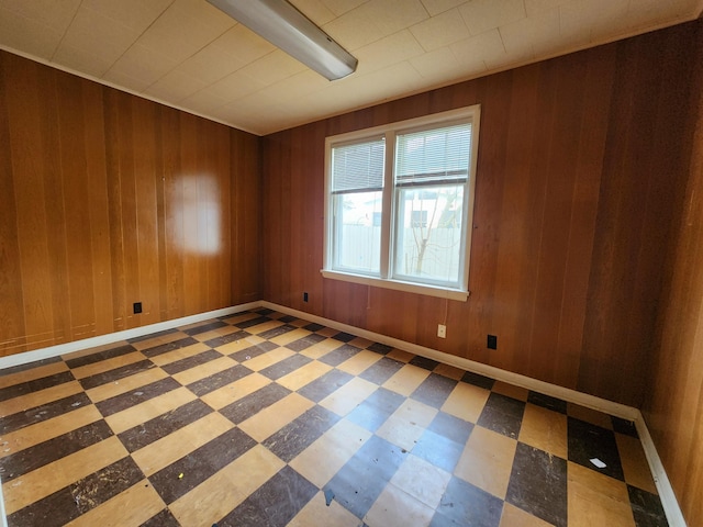 empty room with wooden walls