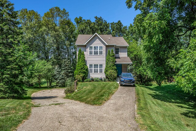 view of front of property with a front lawn