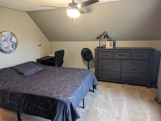 carpeted bedroom with ceiling fan and lofted ceiling