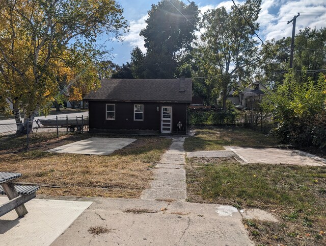 bungalow-style home with a patio area