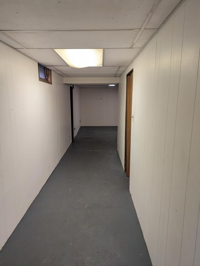 basement with wood walls