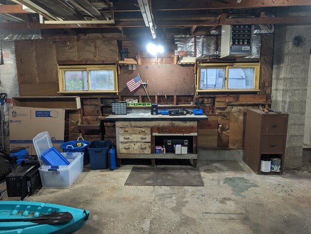 interior space featuring a workshop area and concrete flooring