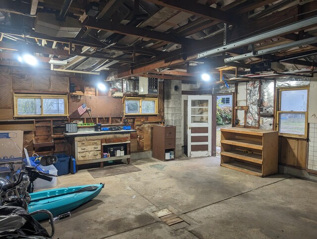 interior space with a workshop area and concrete floors