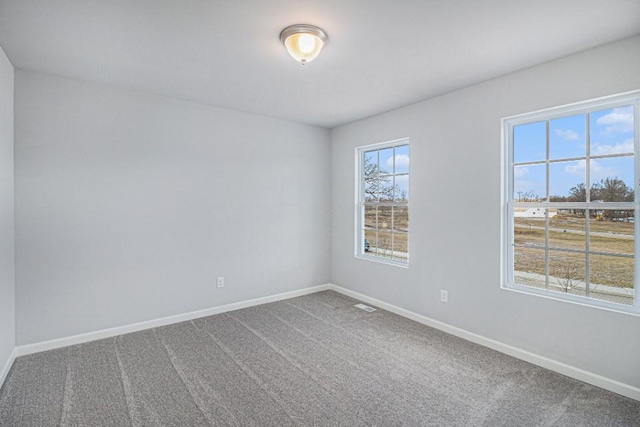 empty room with carpet floors