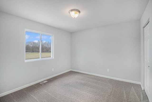 view of carpeted spare room