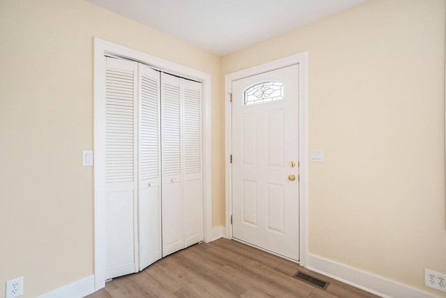 entrance foyer featuring light wood-type flooring