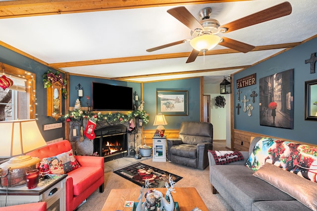 living room featuring beamed ceiling, light colored carpet, and ceiling fan