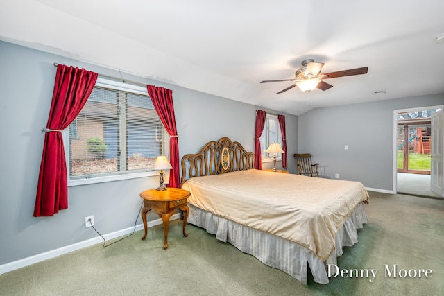 bedroom with carpet floors, vaulted ceiling, and ceiling fan