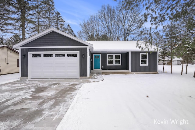 ranch-style house featuring a garage