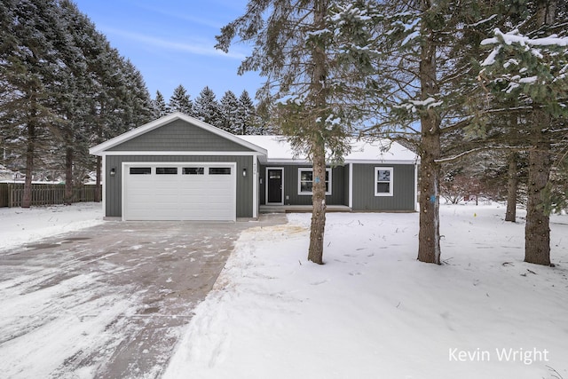 ranch-style home with a garage