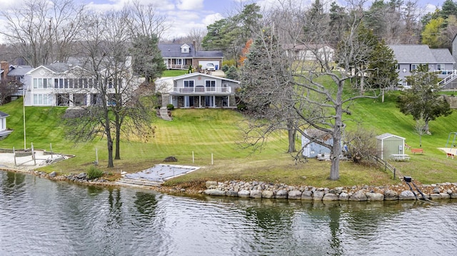 drone / aerial view featuring a water view