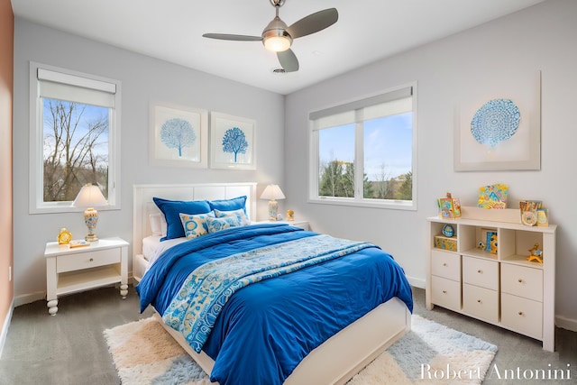 carpeted bedroom featuring ceiling fan