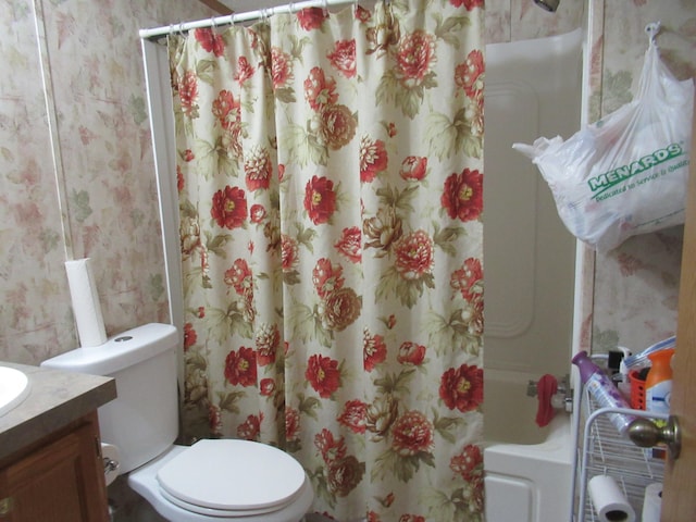 full bathroom with vanity, shower / bath combination with curtain, and toilet